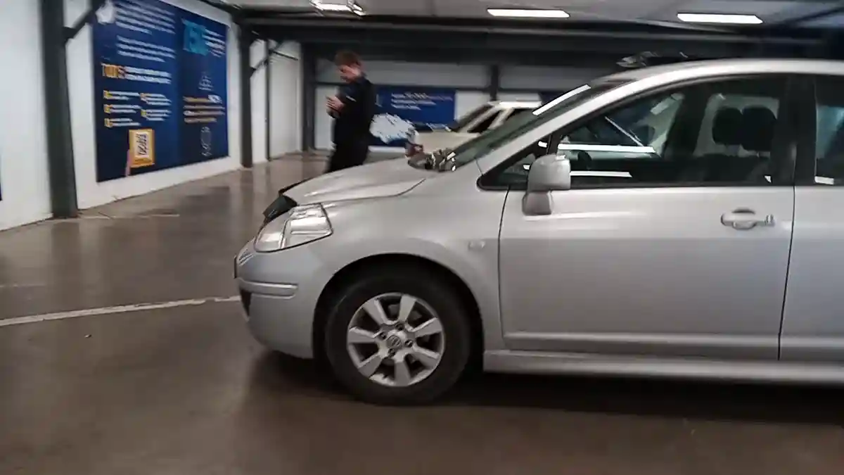 Nissan Tiida 2013 года за 5 000 000 тг. в Астана