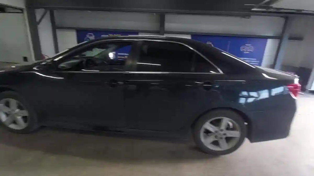 Toyota Camry 2014 года за 8 600 000 тг. в Астана