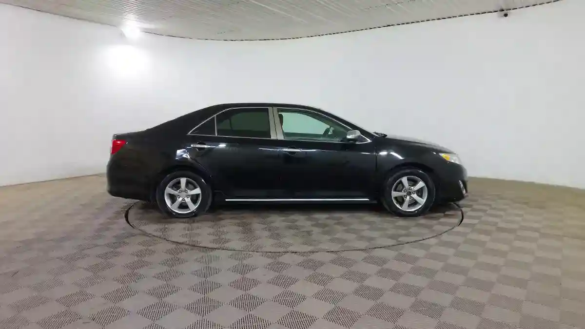 Toyota Camry 2014 года за 7 490 000 тг. в Шымкент