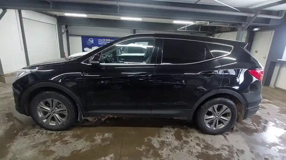 Hyundai Santa Fe 2014 года за 9 500 000 тг. в Астана