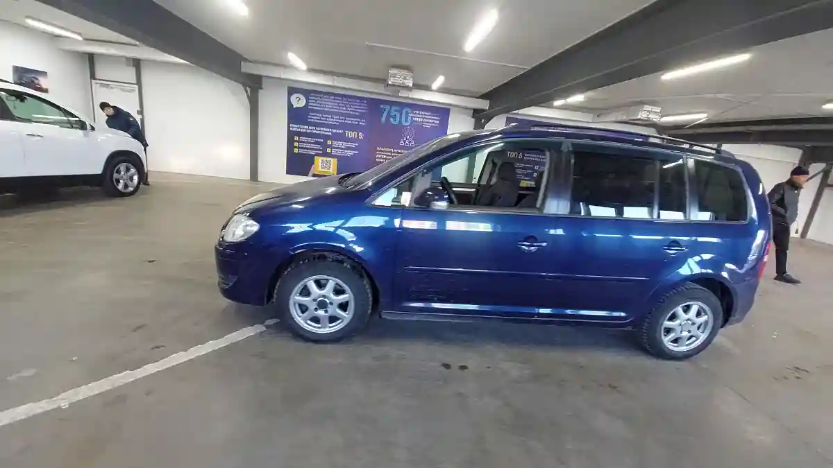 Volkswagen Touran 2008 года за 3 390 000 тг. в Астана