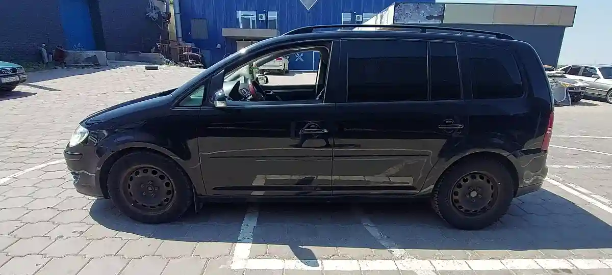 Volkswagen Touran 2009 года за 5 500 000 тг. в Караганда