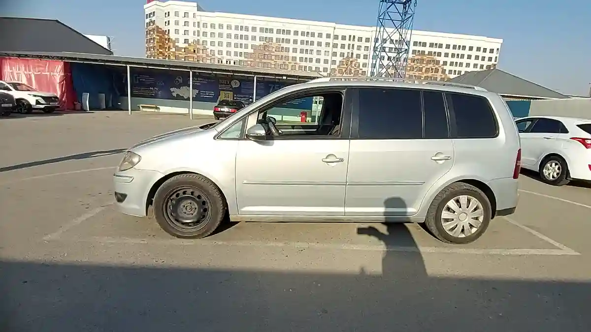 Volkswagen Touran 2009 года за 4 500 000 тг. в Шымкент